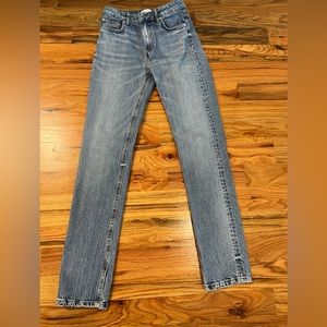 Zara straight leg light wash jeans with bottom slit.
